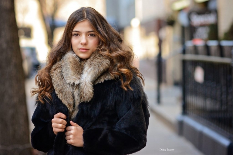 portrait of a girl in a fur coat on the upper east side of manhattan, by daisy beatty photography